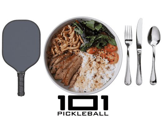 a balanced meal in a plate with utensils and pickleball paddle.