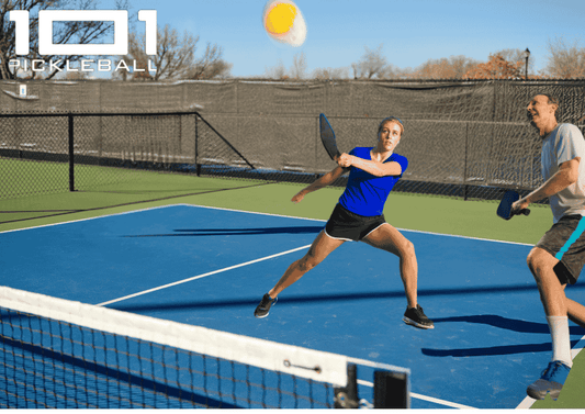 A pickleball player poaching