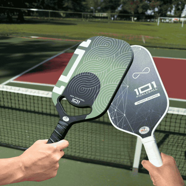 Holding 101 Pickleball's Zen Control and Infinity Balance paddle